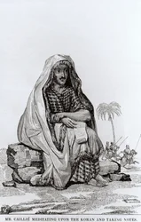 M. Caillie (1799-1838) méditant sur le Coran et prenant des notes